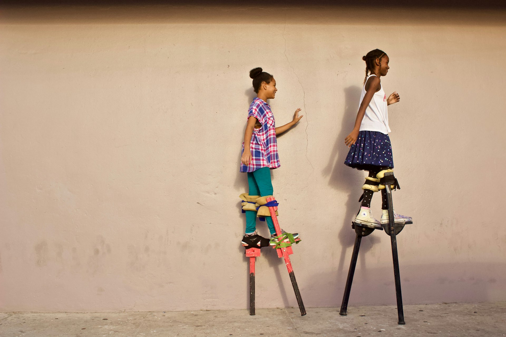 a woman and a man on a stand